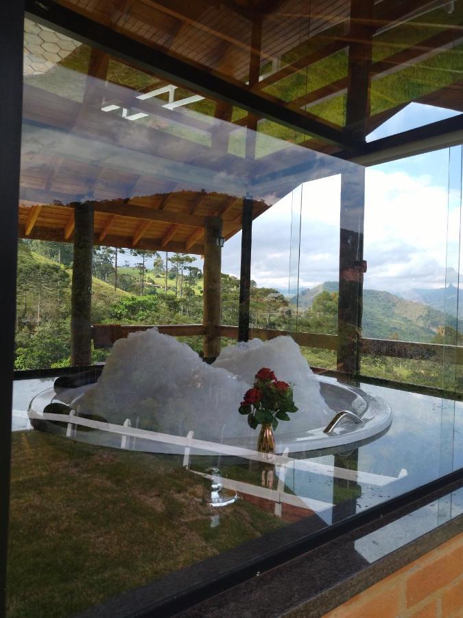 Chalés xanoti oferece Conforto e tranquilidade. Sapucaí-Mirim Exterior foto